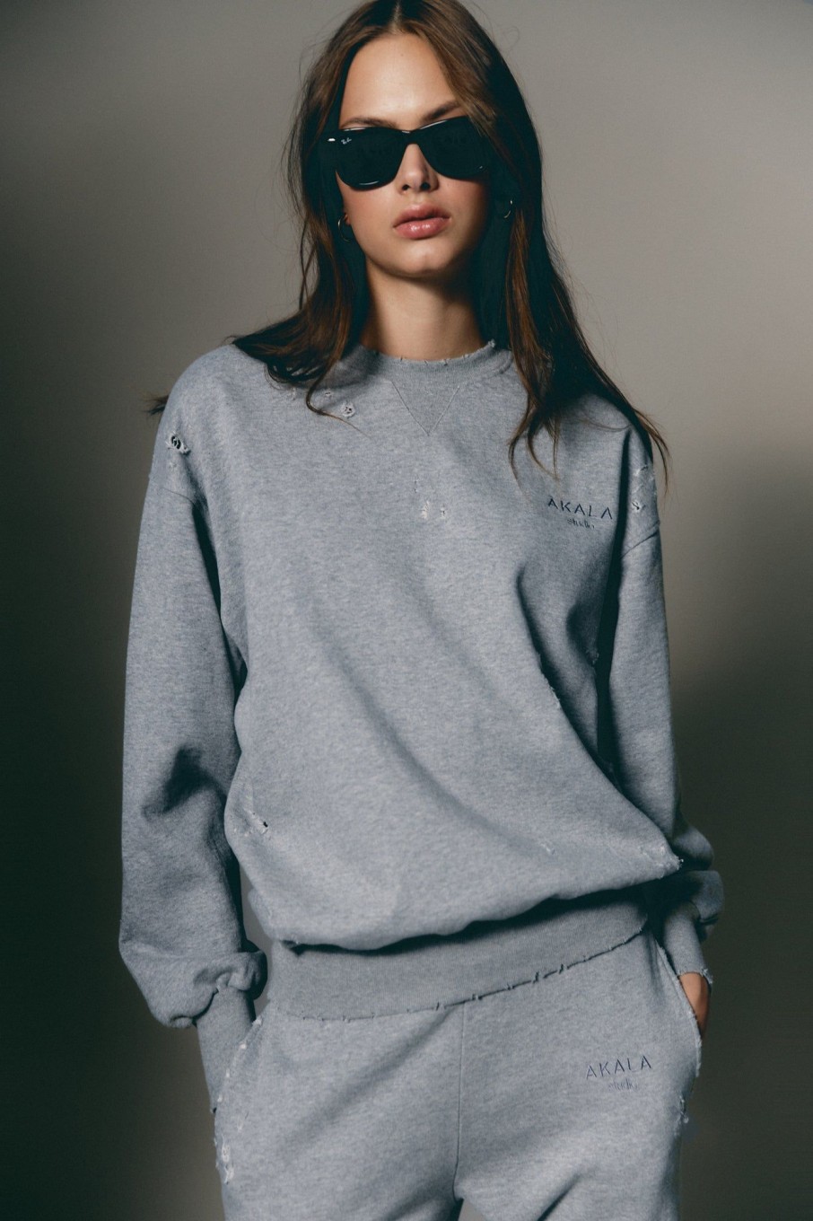 Akala Studio Distressed Grey Sweater | Sweats